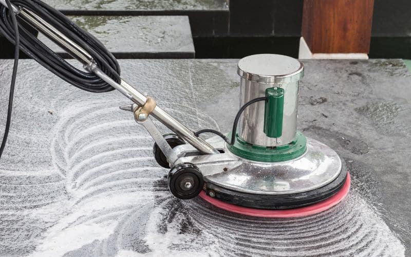 Exterior stone floor cleaning with polishing machine and chemica Exterior stone floor cleaning with polishing machine and chemica